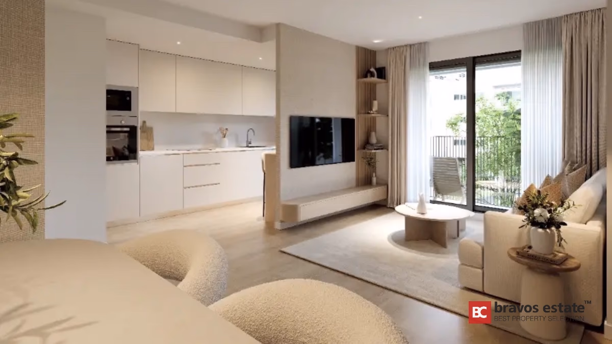 Modern open-plan living room with kitchen and terrace in Alicante apartment