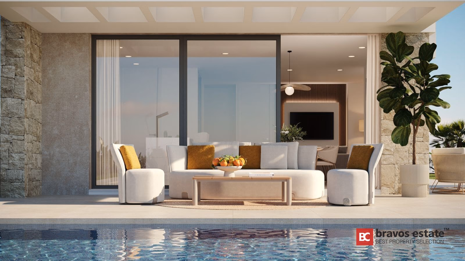 Зона отдыха у бассейна в Aura — белые диваны, яркие подушки, pergola и каменная стена