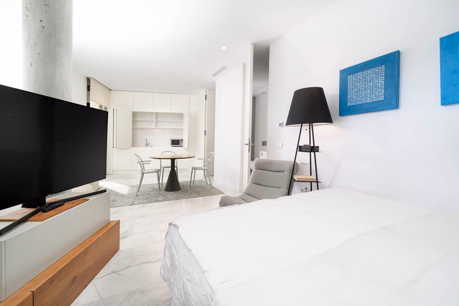 Basement guest suite with bed area and kitchenette