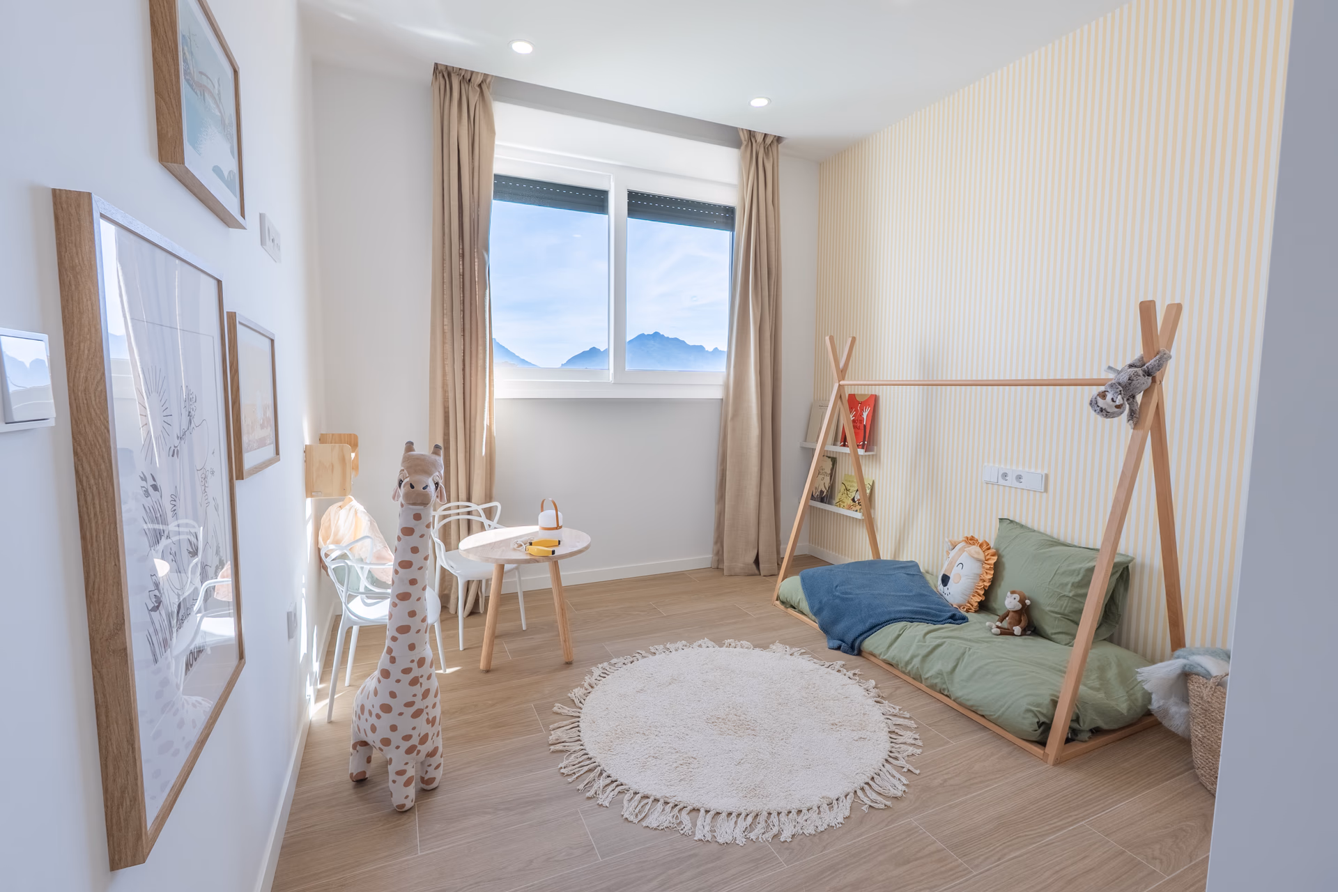 Children's bedroom with window to the mountains