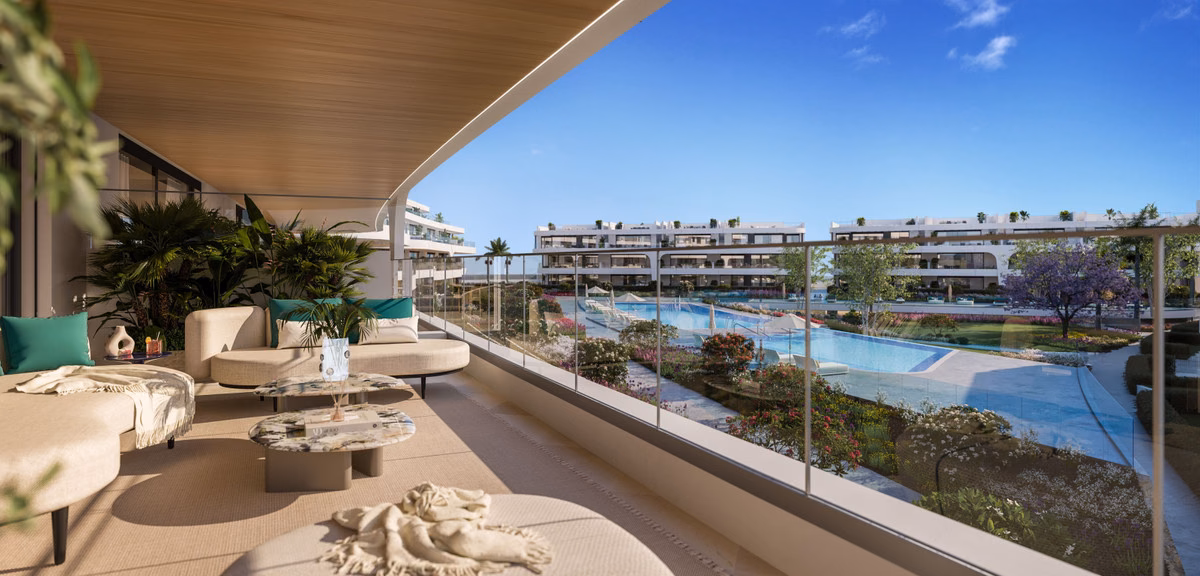 Крытая терраса с видом на бассейн и сады в квартире Naya Residences