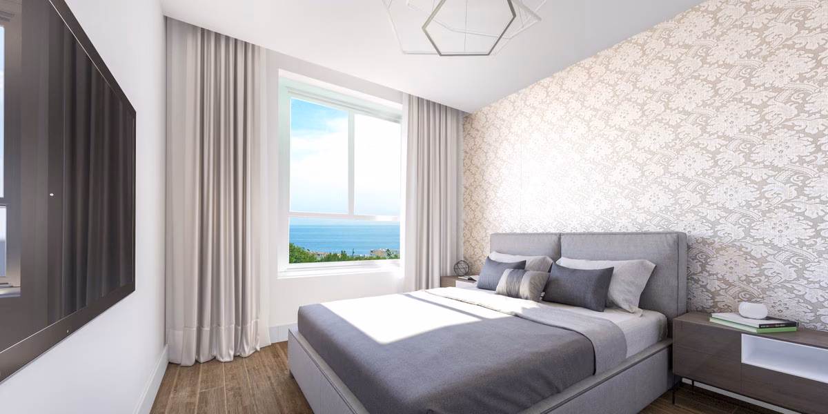 Спальня с видом на море в Residencial Pacaraima
