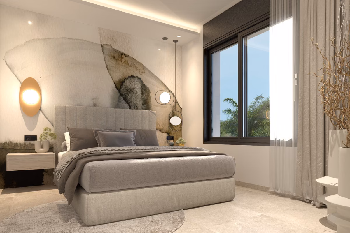 Спальня с акцентной стеной под камень и круглым настенным светильником, Villas Las Filipinas